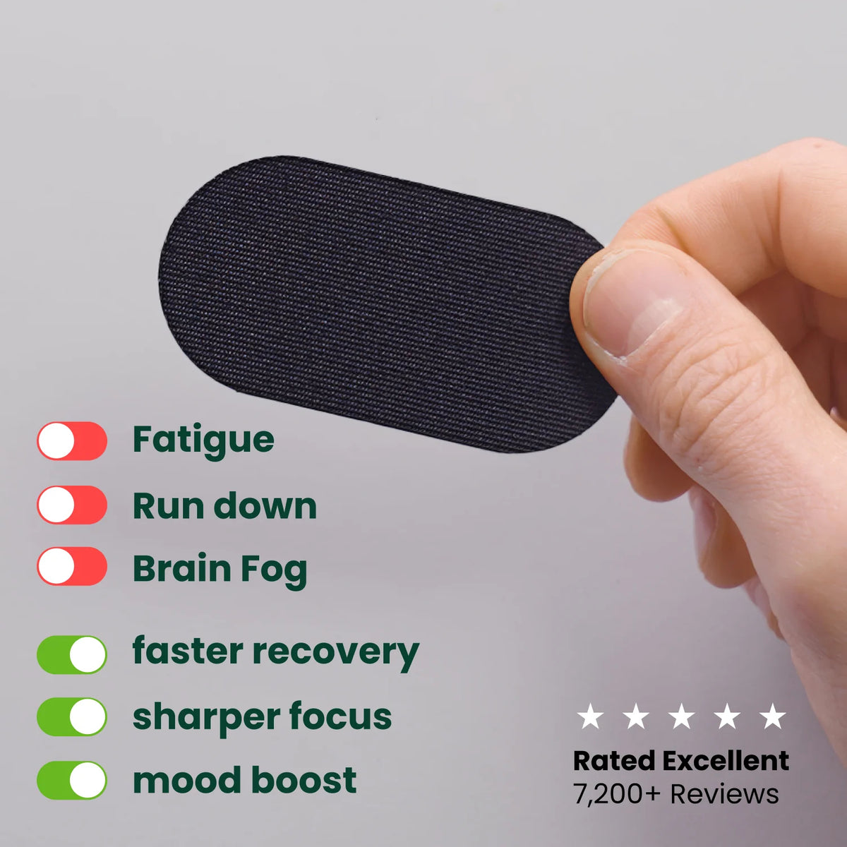 Hand holding a strip of black mouth tape